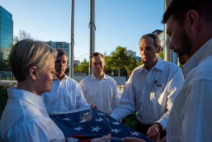 MRO Veterans Raise the US flag